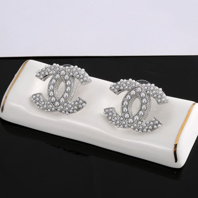 Boucles d'oreilles Chanel Classic Double C à perles
