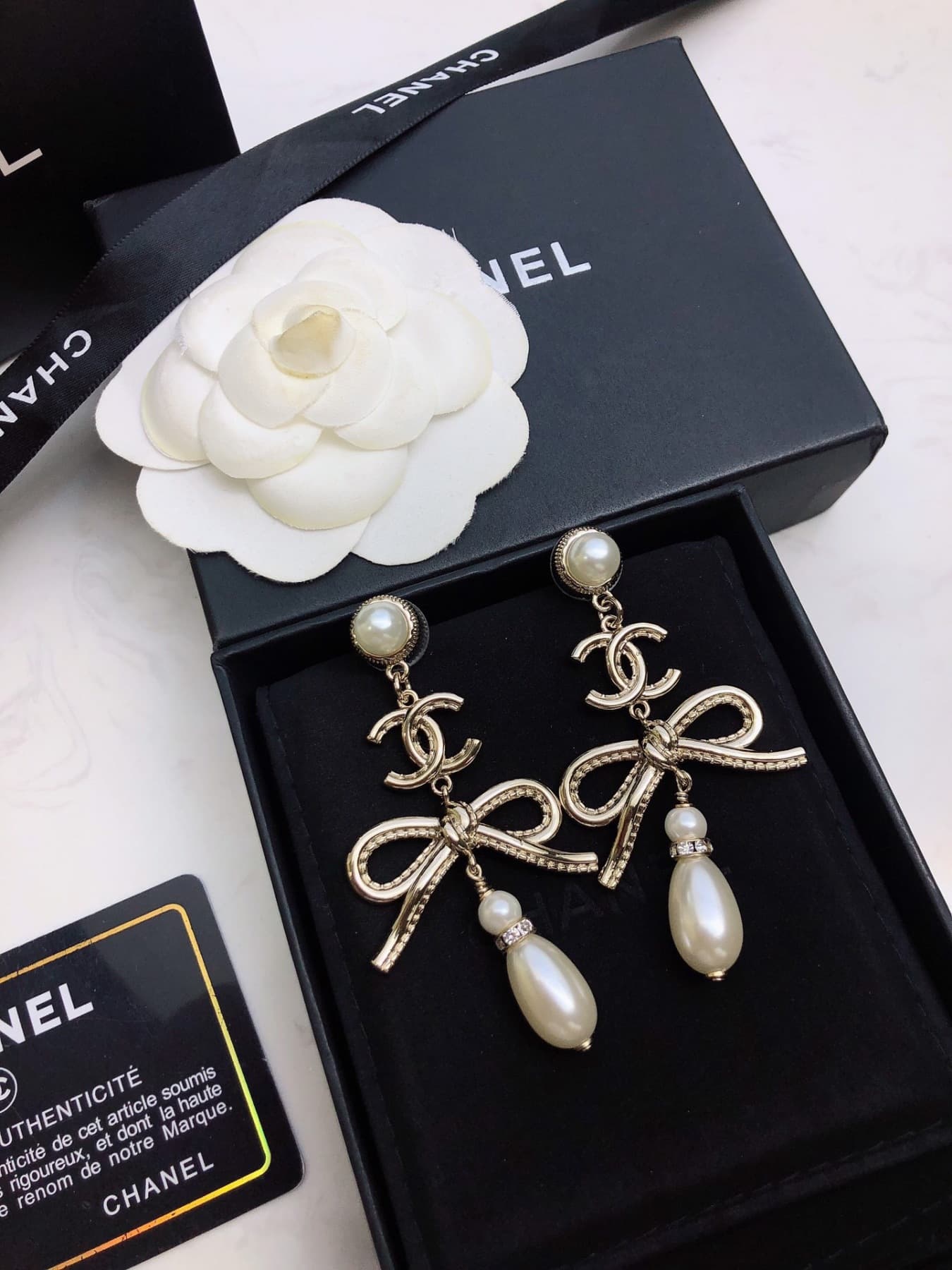 Boucles d'oreilles nœud Chanel