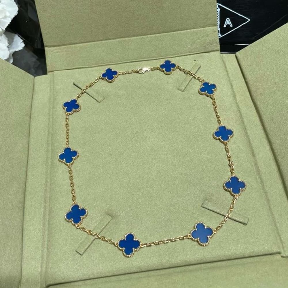 Collier croix et fleur Van Cleef & Arpels VCA - Bijou